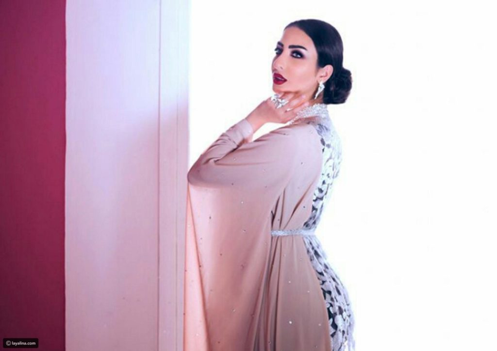 نور الغندور وزوجها 11