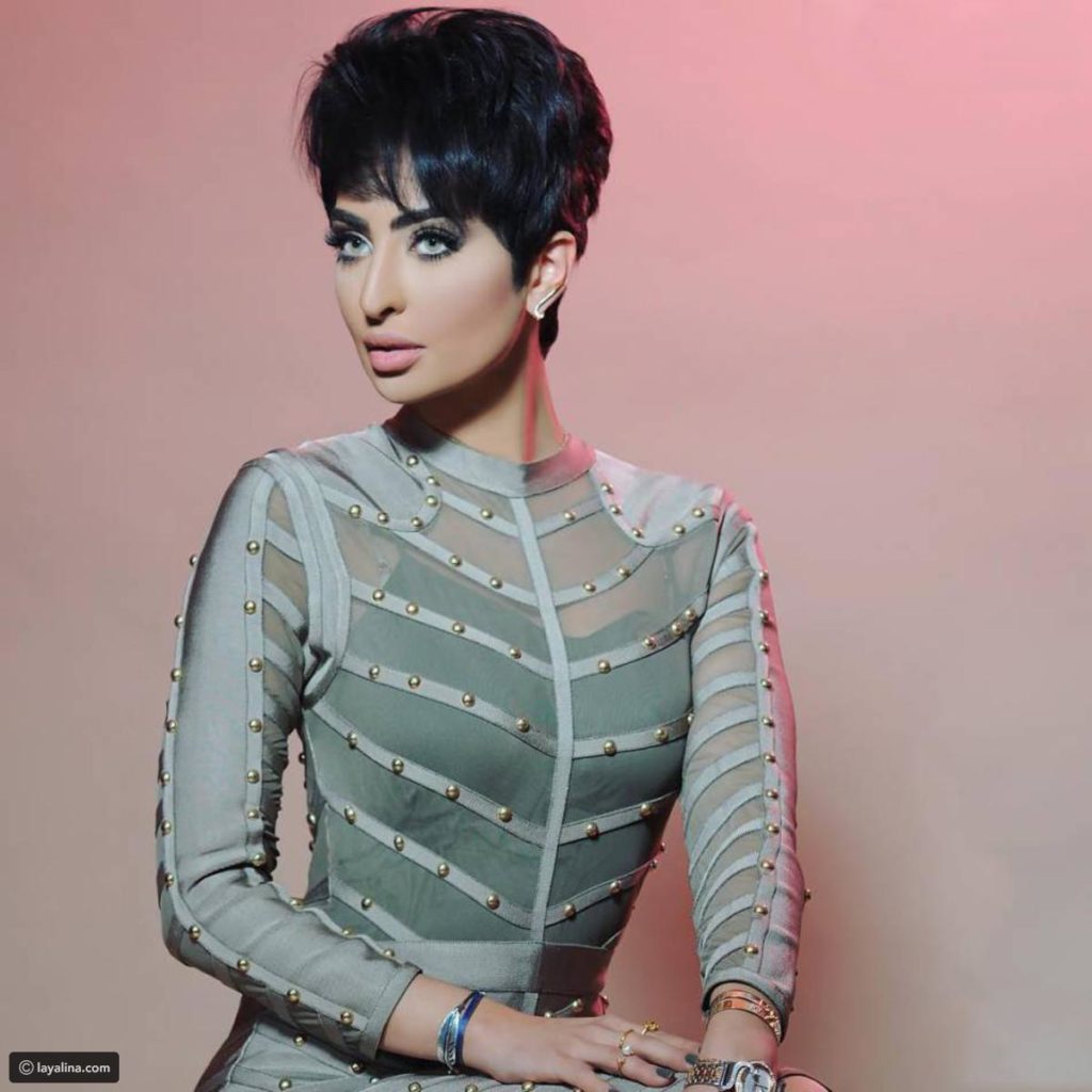نور الغندور وزوجها 14
