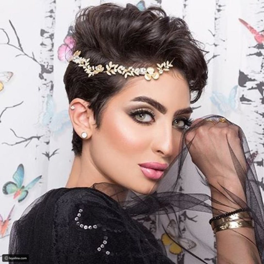 نور الغندور وزوجها 15