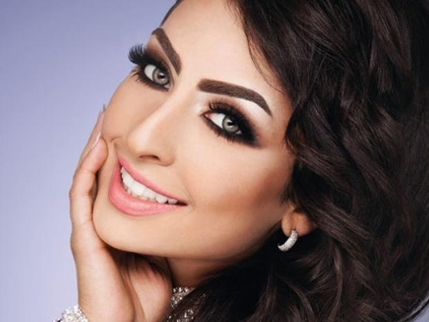 نور الغندور وزوجها 3