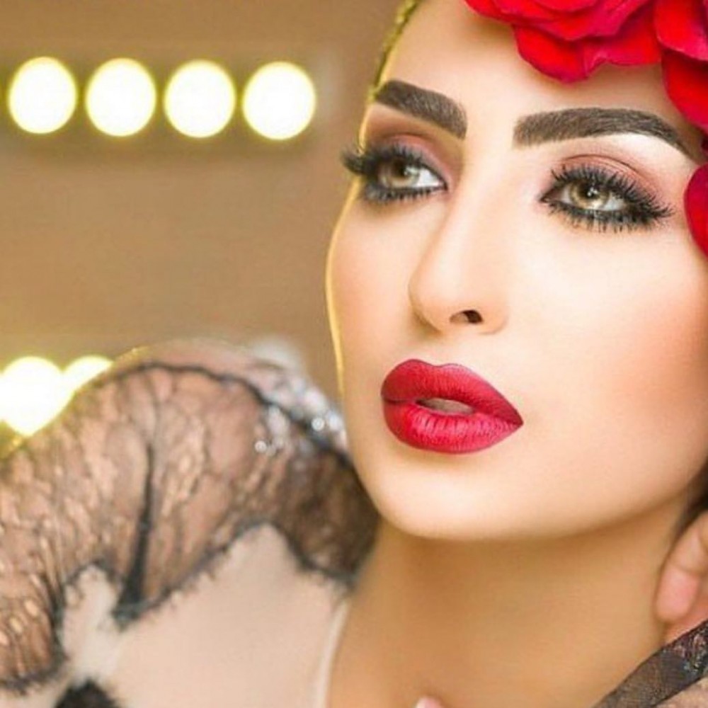نور الغندور وزوجها 8