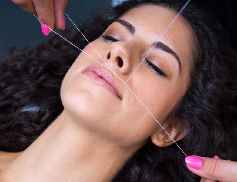 إزالة شعر الوجه بالخيط